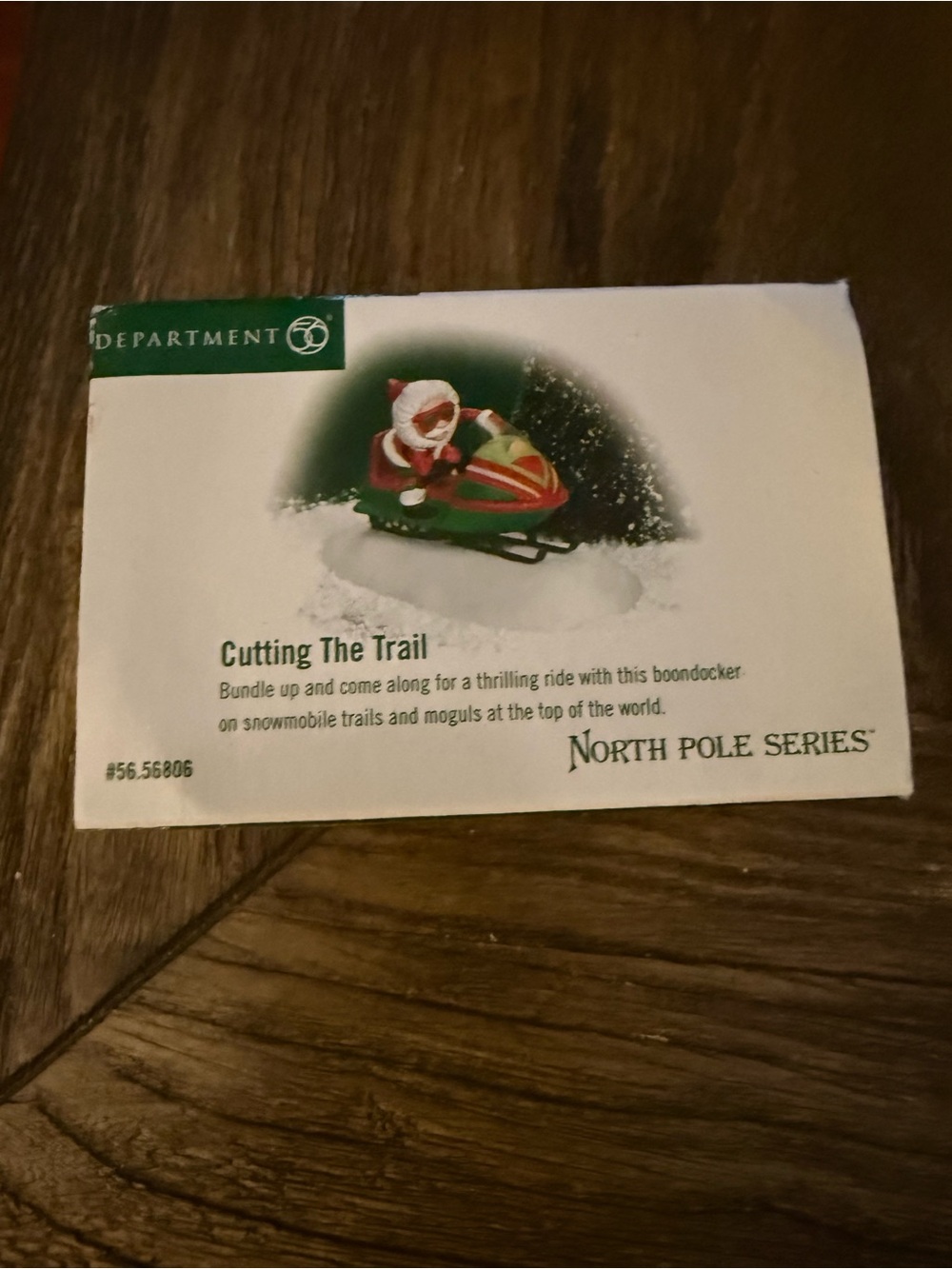 Retired Dept 56 North Pole Cutting the trail